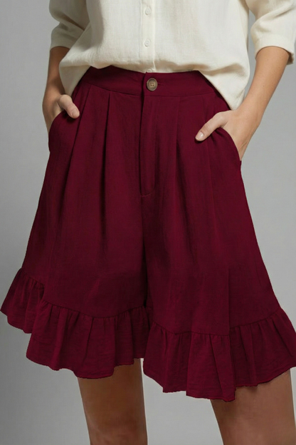 Violet | High Waisted Ruffle Hem Pleated Shorts